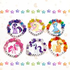 four bracelets with pony designs on them sitting next to star shaped stars and the words i love my little pony written in small letters