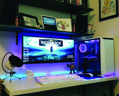 a desktop computer sitting on top of a white desk