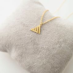 This necklace is a piece of our new collection of Allah necklace made from sterling silver and 14k gold. The collection includes different designs that suit all tastes Kufi/calligraphy, heart/rectangle/triangle shapes, tiny/big sizes. Here is the link for the full collection: https://etsy.me/2Swd0lPAll the designs can be made as necklace, bracelet, and earrings. If you also want a complete set that includes a necklace, a bracelet and earrings please get in touch with us. We accept custom orders! Minimalist Handmade Gold Charm Necklace, Gold Sterling Silver Pendant Charm Necklace, Handmade Gold Charm Necklace In Sterling Silver, Minimalist Yellow Gold Pendant Charm Necklaces, Minimalist Yellow Gold Necklace For Gift, Gold Sterling Silver Pendant Necklace, Handmade Gold Initial Necklace In Minimalist Style, Gold Minimalist Pendant Charm Necklace, Handmade Gold Minimalist Initial Necklace