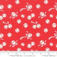 a red background with white tennis balls and bats on it, as well as a ruler