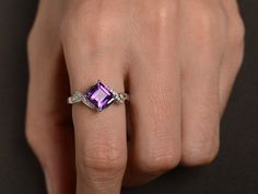 Welcome to my shop, you can find many beautiful gemstone jewelry here, and you also can ask for customized service. Main Stone: amethyst, square cut, measures 7X7mm, 1.62 carats Accent Stones: cz Metal: 925 sterling silver plated with rhodium. I also can provide metal options such as 14k solid yellow/white/rose gold Setting: four claw basket setting more rings: https://www.etsy.com/shop/XCjewelryStudio?ref=hdr_shop_menu It's a perfect gift for the person who was born in February (Birthstone), it Rectangular Purple Amethyst Ring For Anniversary, Square Cut Amethyst Ring For Anniversary, Purple Amethyst Ring With Accent Stones, Rectangular Shape, Rectangular Purple Amethyst Ring With Accent Stones, Purple Square Cut Jewelry For Gifts, Purple Amethyst Ring With Rectangular Stone For Anniversary, Amethyst Ring With Rectangular Purple Stone For Anniversary, Rectangular Purple Amethyst Wedding Ring, Anniversary Square Cut Amethyst Ring