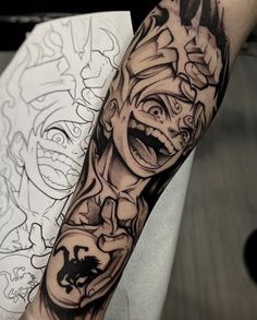 a person with a tattoo on their arm