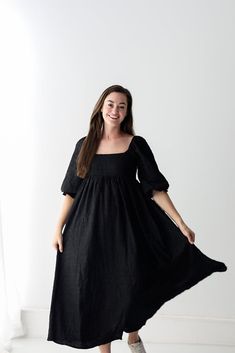 The Dress to Impress Black Maxi Dress is the little black dress of your dreams! This beautiful maxi is detailed with a flattering square neckline, dramatic peasant sleeves, an empire waist, textured material and best of all, pockets! We love the cut of this dress because it's flattering on all body types. The dress is fully lined and non sheer. Pair this with sneaker or boots for a more casual look. Or dress it up with your favorite silver accessories and high heels! - Fits true to size * If you Black Fall Dress With Straight Neckline, Black Dress With Straight Neckline For Fall, Fall Black Dress With Straight Neckline, Black Square Neck Maxi Dress For Fall, Black Maxi Dress With Smocked Bodice For Fall, Black Fitted Maxi Dress With Gathered Sleeves, Spring Black Maxi Dress With Gathered Sleeves, Black Maxi Dress With Gathered Sleeves For Spring, Black Square Neck Dress With Gathered Sleeves