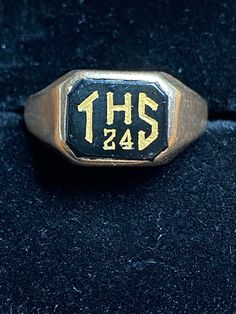 "Gorgeous and antique 10K yellow gold class ring for your consideration.  This 1924 ring was from THS  and has engraved \"NMN\" on the inside of the band.  It is a traditional signet style with a black onyx center stone. The letters are carved into the stone and the gold added.  The setting is 10mm x 9mm and it is a size 7 1/2.  It weighs 4 grams.  What a wonderful piece of history!!" Gold Class, Class Rings, Tulle Bows, Black Onyx Ring, Onyx Ring, Red Dots, White Gold Diamonds, Black Onyx, Blue Topaz