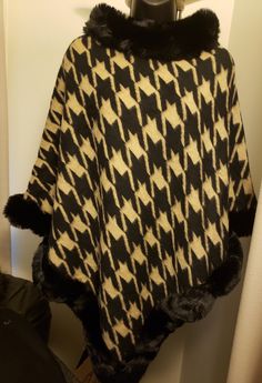 Warm beautiful poncho.  We have different prints and color. Cozy Winter Cape Poncho, Chic Winter Shawl Cape, Chic Winter Shawl Poncho, Fall Poncho With Faux Fur Trim Cape, Elegant Winter Poncho One Size, Chic One Size Poncho For Winter, Fur Poncho, Winter Top, Ladies Poncho