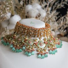 Choose from a wide variety of hues and textures. We've created the ultimate bridal accessory. Beautifully embroidered with a soft pastel tone, this handmade necklace is a charming choice for a bride-to-be. Bohemian Embroidered Jewelry For Wedding, Bohemian Chandbali Necklaces For Wedding, Embroidered Jewelry For Wedding And Festivals, Handmade Kundan Choker For Wedding, Multicolor Intricate Design Necklace For Wedding, Elegant Embroidered Jewelry For Festive Occasions, Multicolor Intricate Wedding Necklace, Multicolor Intricate Design Wedding Necklace, Elegant Embroidered Festive Jewelry