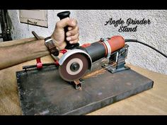 an angle grinder is being used on a piece of wood