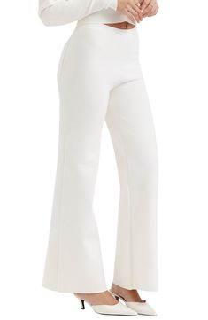 A mid rise and cotton-blend fabrication add modern comfort to pull-on pants designed with flared legs for trendsetting appeal. Exclusive retailer Pull-on style Back patch pocket 70% cotton, 30% nylon Dry clean Imported Elegant Stretch Flares For Spring, Chic Stretch Flare Trousers, Chic Stretch Flares Trousers, Chic Stretch Flares, Modern Stretch Wide Leg Pants For Spring, Chic Spring Flares Trousers, Chic Spring Flare Trousers, Chic Stretch Full-length Flares, Chic Stretch Full Length Flares