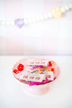 a plate with candy on it sitting on a table