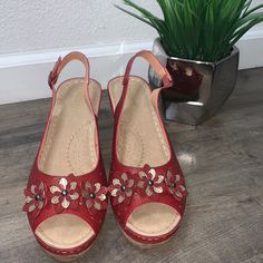 Alexis Leroy Super Comfortable Nwot Red Peep Toe Slingback Wedge Size 11. Embellished With Red/Gold Flowers On The Front Of The Shoe. 3” Heel. *Shoe1 Red Synthetic Slingback Sandals For Spring, Red Slingback Wedge Sandals For Summer, Womens Shoes Wedges, Gold Flowers, Red Gold, Wedges, Womens Sizes, Women Shoes, Heels