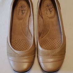 Beige Slip On Flats. Insoles Are Very Cushiony. Man Made Materials. Beige Flats With Arch Support, Beige Flats With Ortholite Insole, Medium Width, Beige Flats With Arch Support And Round Toe, Beige Closed Toe Flats With Arch Support, Beige Cushioned Low-top Flats, Beige Low-top Cushioned Flats, Comfortable Round Toe Heels With Cushioned Footbed, Comfortable Cushioned Round Toe Heels, Black Loafer Shoes