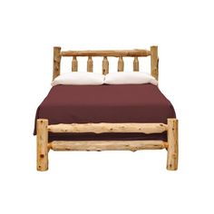 a wooden bed frame with two pillows on it