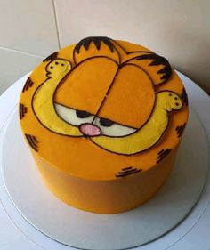 the cake is decorated with an image of a cartoon character on it's face