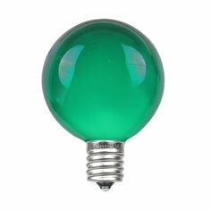 a green light bulb on a white background