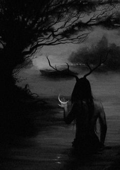 a person with long hair standing in water next to trees and an antelope