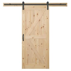 a wooden sliding door with black hardware