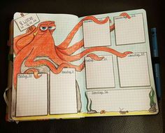 an open notebook with some drawings on the pages and writing in it, including an octopus