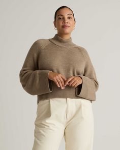 Australian Merino Wool Cropped Mock Neck Sweater Beige Merino Wool Sweater With Ribbed Cuffs, Versatile Merino Wool Sweater For Fall, Beige Wool Sweater With Relaxed Fit, Modern Fitted Merino Wool Sweater, Versatile Merino Wool Winter Sweater, Versatile Winter Merino Wool Sweater, Versatile Merino Wool Sweater For Winter, Fitted Merino Wool Sweater In Solid Color, Versatile Wool Sweater For Winter