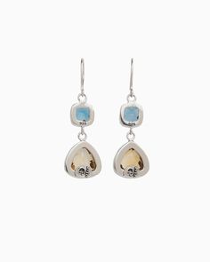 Timeless and bold, the Angelfish Double Stone Drop Earrings are a great addition to your jewelry collection. Handcrafted from sterling silver, these earrings showcase a harmonious blend of two stacked stones: a petite square London blue topaz and a larger triangular citrine, creating a stunning contrast and a truly eye-catching design. Metal: Sterling silver Stones: London blue topaz, citrine Dimensions: 42mm Stone Sizes: 9mm x 9mm, 12mm x 11mm Style #: E121LbC Silver Topaz Earrings With Gemstone Accents, Sterling Silver Multi-stone Earrings Fine Jewelry, Sterling Silver Drop Earrings With Gemstone Accents, Modern Sterling Silver Earrings With Gemstone Accents, Fusion Multi-stone Sterling Silver Earrings, Polished Topaz Jewelry, Fusion Sterling Silver Multi-stone Earrings, Fusion Style Multi-stone Sterling Silver Earrings, Sterling Silver White Gold Earrings With Gemstone Accents