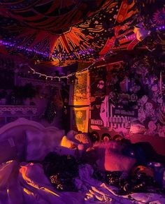 a room filled with lots of colorful lights and decorations