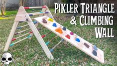 a wooden ladder and climbing wall made out of rocks with the words, piker triangle & climbing wall