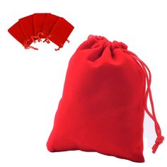 a red bag with five pieces of cloth in it next to an empty drawstring bag