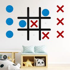 the wall decals are designed to look like tic - tac - toe game