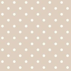 a white polka dot pattern on a beige background