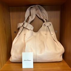 Authentic Salvatore Ferragamo Tote Bag Leather Blush Pink Made In Italy Preloved Condition. Minor Signs Of Used Like Discoloration On Photo #9 Interior Is Clean, Snap Button Closure. Expandable. See Pictures For Details Before Purchase. Approximately 15" X 11" Large Designer Beige Shoulder Bag, Designer Large Beige Shoulder Bag, Large Beige Designer Shoulder Bag, Large Designer Beige Satchel, Large Beige Designer Satchel, Large Designer Shoulder Bag With Handle Drop, Elegant Large Bag For Errands, Designer Shoulder Bag With Rolled Handles For Daily Use, Elegant Large Satchel For Shopping