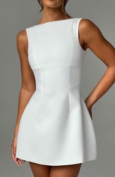 Chic A-line Sleeveless Summer Dress, Modern White A-line Mini Dress, Structured A-line Summer Dress, Sleeveless Mini Dress With Flattering Cut, Flattering Cut A-line Summer Dresses, Summer Flattering Cut A-line Dresses, Chic Seamed Midi Length Dress, Chic Seamed Midi-length Dress, Chic Midi-length Seamed Dress