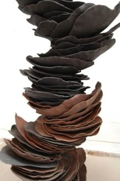 a sculpture made out of various pieces of leather