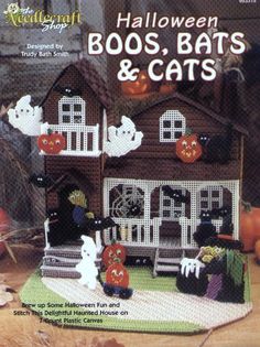 the front cover of a halloween book with cats and pumpkins on it's roof