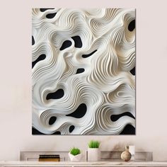 an abstract white and black painting on a wall