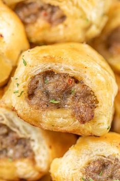 close up view of meatball rolls with parsley on the top and in the middle