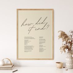 a framed poster with the words how did i end? in cursive writing