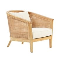 a wooden chair with a white cushion on it