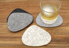 "Mid Century Modern Wool Felt Coasters in German Made, 100% Merino Wool Felt. Naturally durable, heat resistant and beautiful, these fun coasters will absorb condensation without soaking through, protecting your delicate surfaces while looking great! As an added bonus, they are soft and light so no dings to furniture or toes if little ones decide to explore their intriguing shape. Shown in Sandstone, Light Granite, Granite & Anthracite, but available in 49 gorgeous 5mm colors. Mobile users click Wool Felt Coasters, Light Granite, Modern Coasters, Felt Squares, Coaster Crafts, Cool Coasters, Felt Coasters, Mcm Design, Lehigh Valley