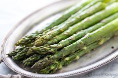 a plate with asparagus on it and the words dairy - free chilled asparagus soup