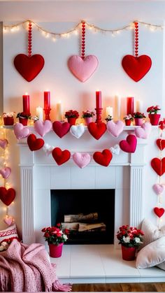 valentine's day mantel decorated with candles and hearts