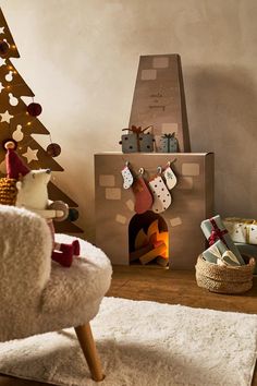 a living room decorated for christmas with stockings on the fireplace