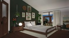 a bedroom with green walls and pictures on the wall