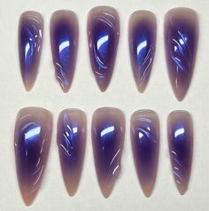 The ultimate mystic nail set! A gorgeous iridescent chrome on top of a royal purple airbrushed design with 3D Gel swirls to finish.  Available in shape Medium Stiletto, Medium Almond, and Short Almond. *Medium Stiletto pictured* Purple And Blue Chrome Nails, Aura Nails Stiletto, Blue And Purple Nails Designs, Purple Stiletto Nails Design, Purple Iridescent Nails, Nails Chrome Designs, Metallic Purple Nails, Purple Chrome Nails Design, Simple Purple Nails