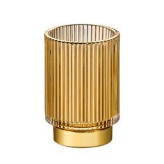 a gold colored vase on a white background