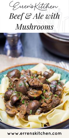 a blue plate topped with pasta and mushrooms