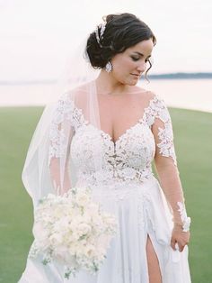 a woman in a wedding dress holding a bouquet