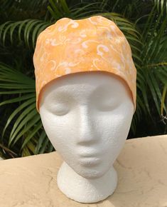 ORANGE SWIRLS - Woman surgical cap for doctor, scrub hat for vet, scrub cap for nurse, hat for chemo patient,  baker hat  &  chef hat    OPTIONAL- I can add buttons for the masks 😷 (NO EXTRA CHARGE ) just let me know if you would like that option. Made from quality 100% cotton fabric and elastic in the back with a stopper. It's a one size fits all.  All my caps are handmade by me which will guarantee to you great quality every time.  All edges have been surged to prevent fraying.  Machine washable - cold water.  Tumble dry low or hang to dry. Made in a smoke - free/ pet - free facility.  Every cap is finished and ready to be shipped in 3-5 days.                  FREE and FAST SHIPPING.  For special requests  on different  fabrics , please write me a message. WEEKLY, NEW CAPS ARE POSTED  ! Baker Hat, Vet Scrubs, X Ray Tech, Doctor Scrubs, Xray Tech, Nurse Hat, Chef Hat, Chefs Hat, Surgical Caps