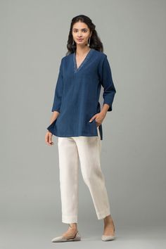 Good Earth – Stylish Sustainable Luxury Retail | Goodearth.in Cotton Kurta With Jeans, Kurta For Jeans For Women, V Neck Short Kurti Design, Cotton Tunics For Women Stylish, Khadi Cotton Kurti Designs Latest, Short Kurta Designs Women With Jeans, Short Kurti Styling Ideas, Cotton Tops Designs Casual, Short Tops With Jeans Indian