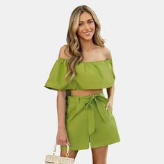 Get summer-ready with our Green Off-Shoulder Cropped Flounce Top & Wide Leg Shorts Set from Cupshe! This playful ensemble features an off-shoulder cropped top with a charming flounce detail, paired with breezy wide-leg shorts for a laid-back yet chic look. Whether you're attending a brunch with friends or a special evening event, this set will ensure you stand out with style and sophistication. Product code: CAA14B4D007QQ Off-shoulder Beach Sets For Spring, Chic Off-shoulder Summer Sets, Green Off-shoulder Crop Top For Spring, Green High-waisted Shorts For Beach, Green Skort With Built-in Shorts For Beach, Flounce Top, Knee Sleeves, Off Shoulder Crop Top, Fleece Shorts