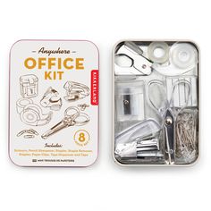 an office kit in a tin with scissors