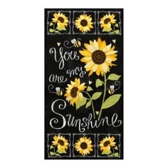 a sunflower with the words you are my sunshine on it and bees flying around